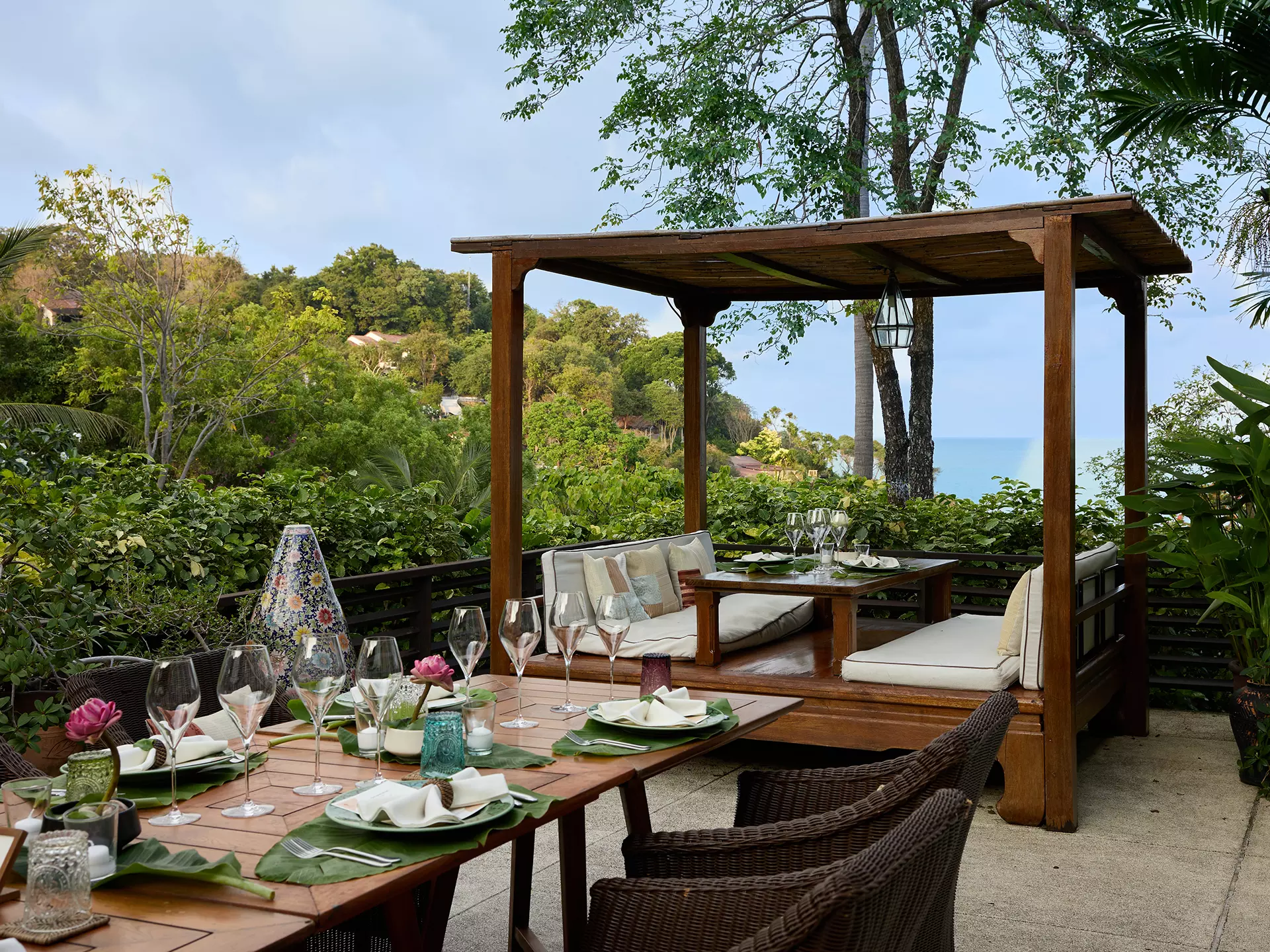 Table setup at RHOY RHOY! Thai Restaurant, Garrya Tongsai Bay Samui overlooking the sea in Koh Samui