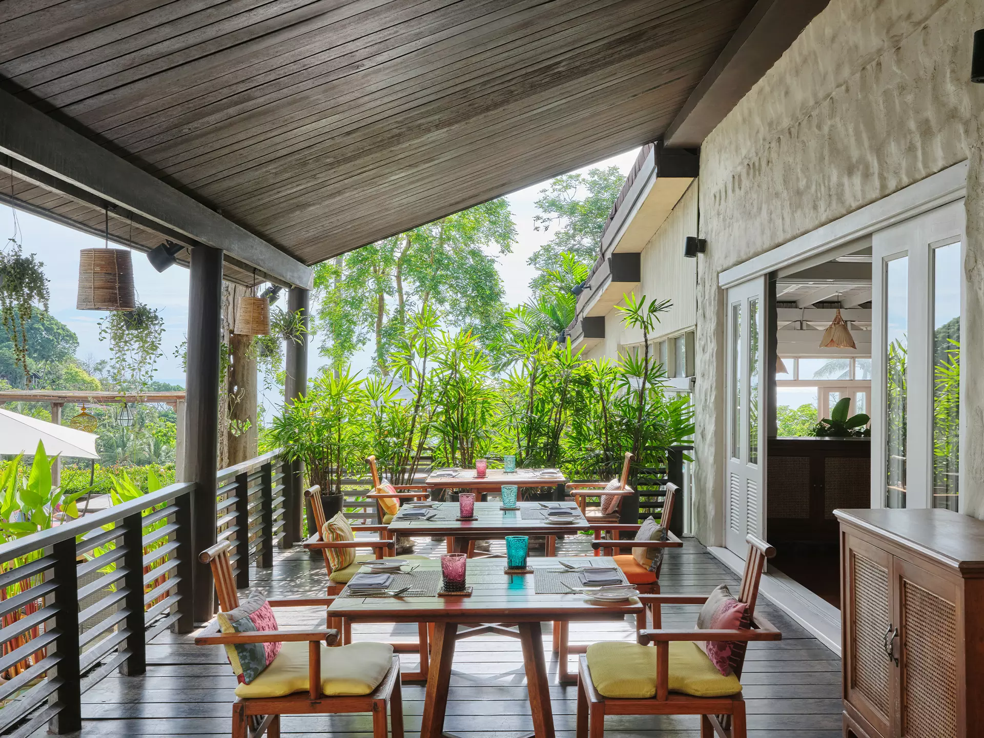 Table setup at RHOY RHOY! Thai Restaurant, Garrya Tongsai Bay Samui overlooking the sea in Koh Samui