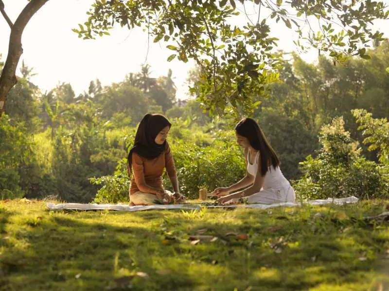 two women in the middle of the nature