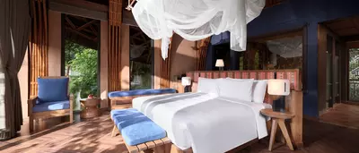 Sunny mountain-view bedroom at Garrya Mu Cang Chai resort.