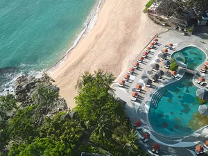 Garrya Tongsai Bay Samui luxury hotel resort featuring a serene beachfront pool overlooking the ocean - Koh Samui 