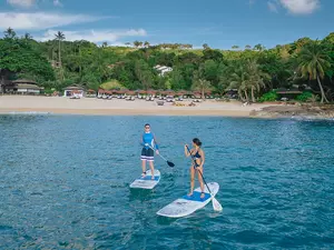 Surf board by the beachfront at Garrya Tongsai Bay Samui, a luxury hotel resort in Koh Samui.