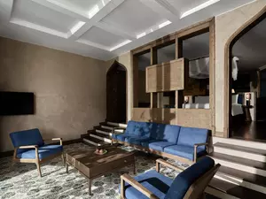 Hmong Garden View Pool Suite living room with minimalist, modern interiors.