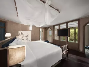 Bedroom interior of the Hmong Garden View Pool Suite