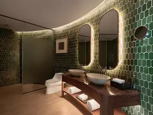 Mù Cang Chải Pool Suite bathroom featuring double sinks and modern design.